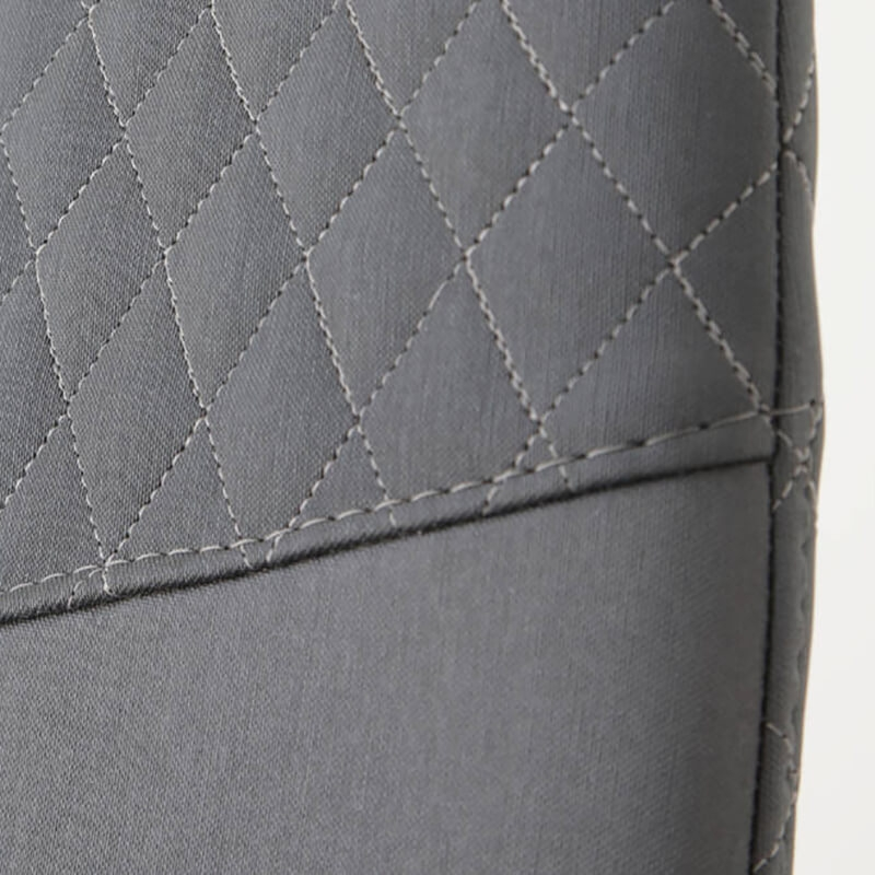 chaise de salle à manger grise au dossier matelassé