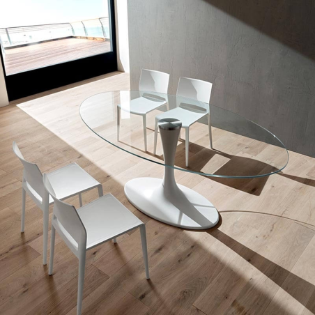 Table tendance ovale en verre transparent pied tulipe blanc - Ruud 