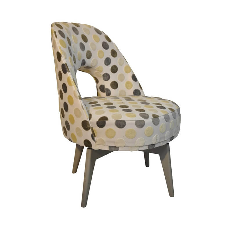 Chauffeuse rotative de fabrication française en tissu à pois - Hugo