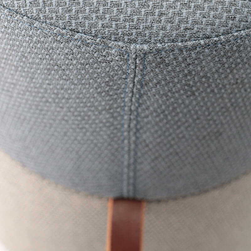 Pouf tendance en tissu avec anse en cuir