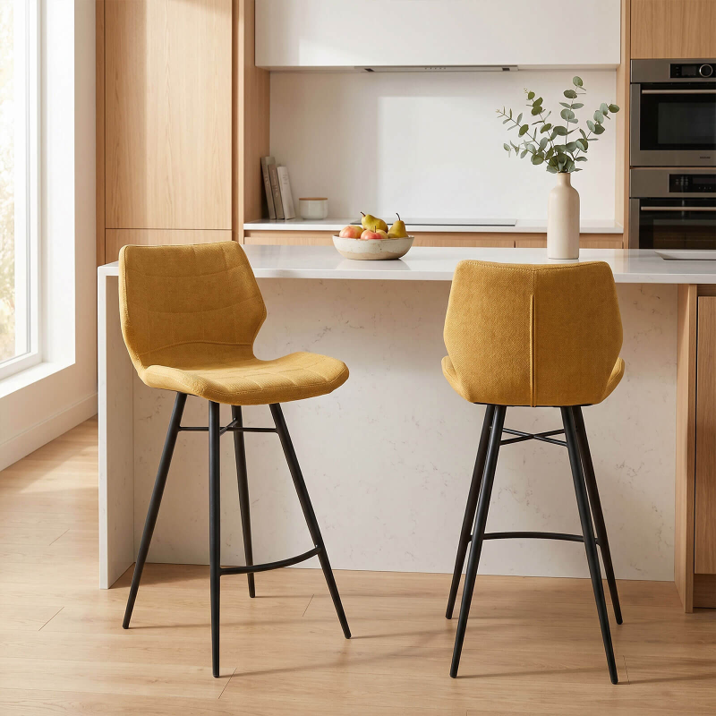 Impia - Tabouret design coque matelassée en tissu et pieds en métal noir