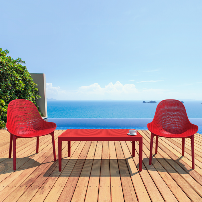 Table basse rouge pour un salon de jardin détente