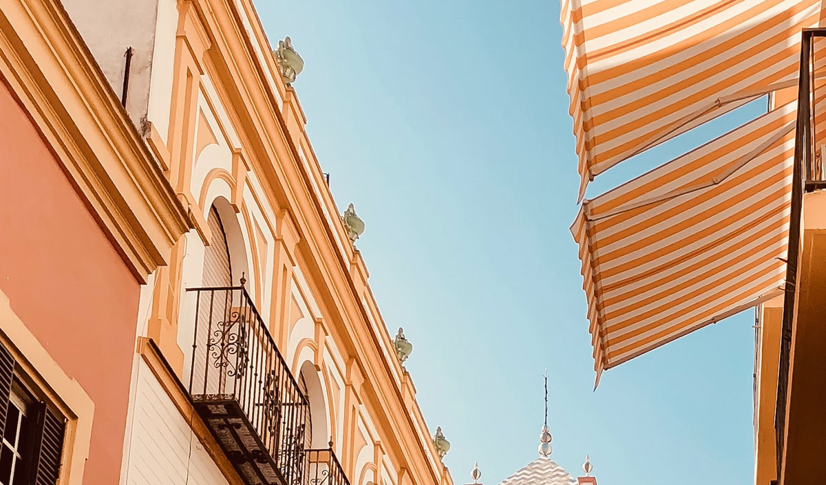 Store banne avec rayures jaune et blanc pour appartement