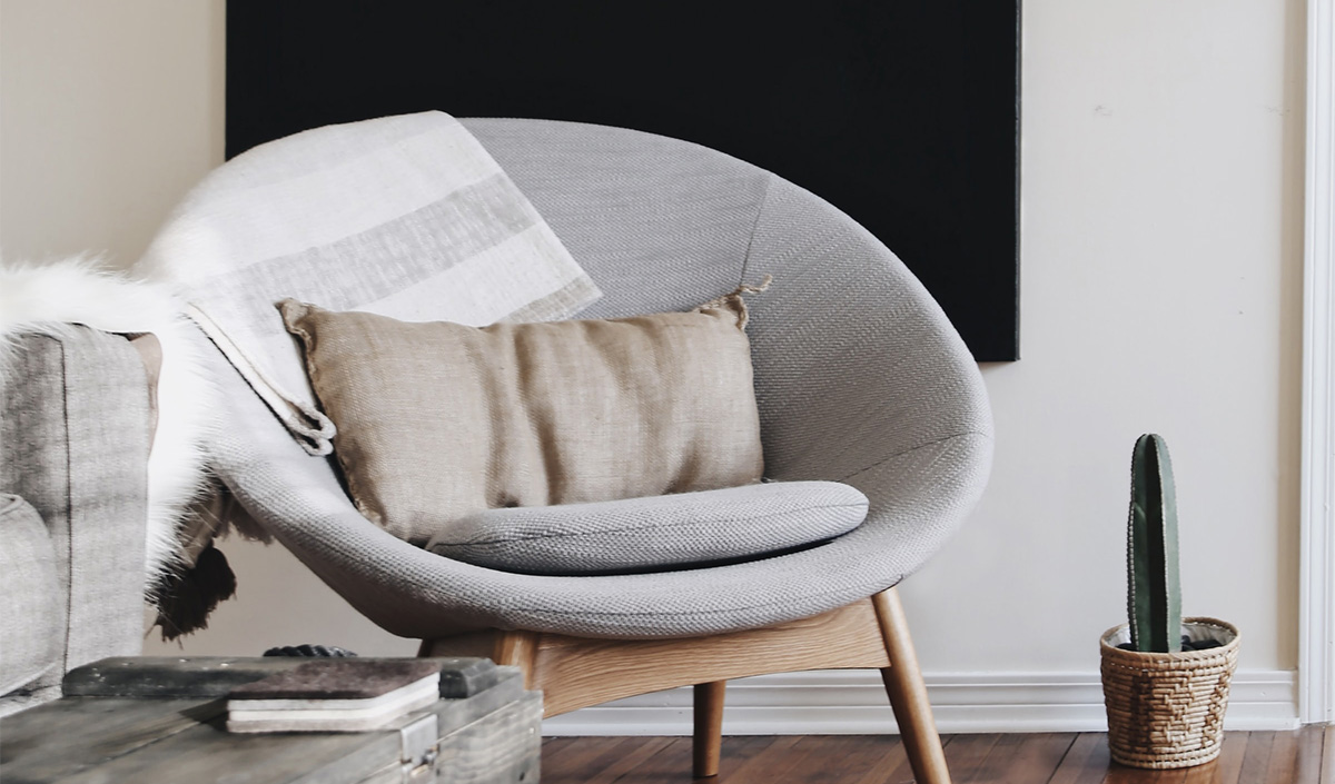 Accessoiriser son fauteuil en tissu avec un coussin rectangle