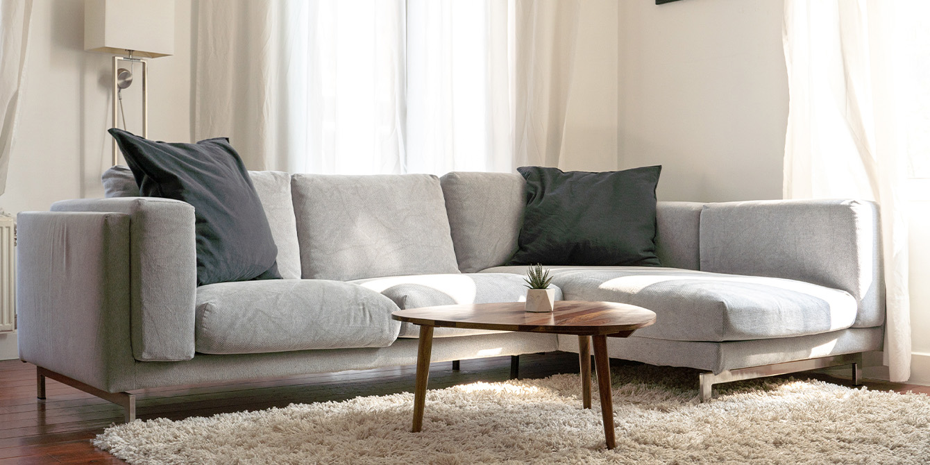 Quelle table basse choisir pour un canapé d'angle ?